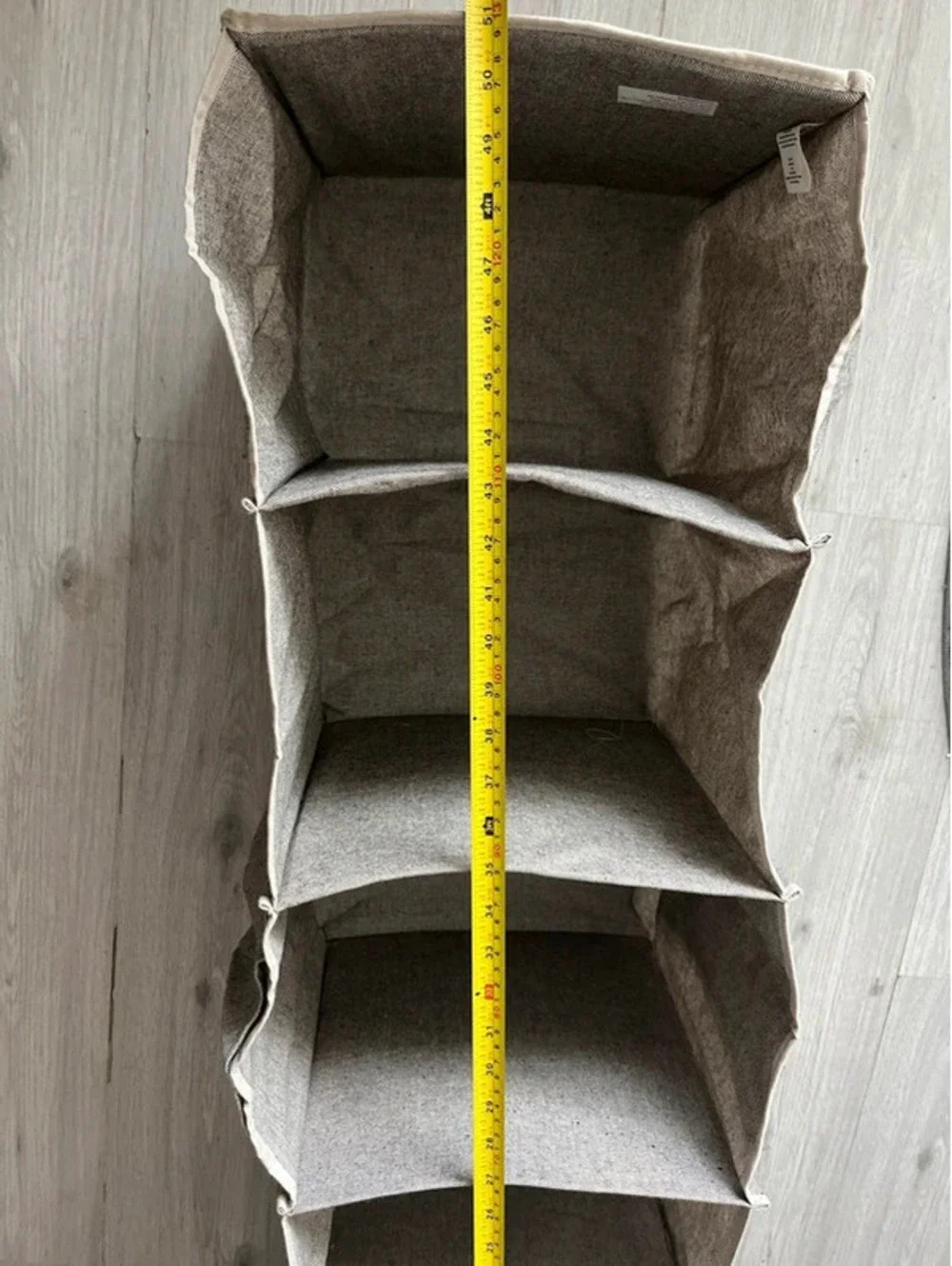 Beige long fabric hanging organizer storage with pockets